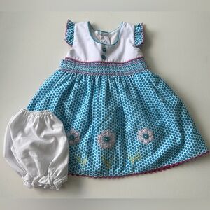 Baby Moda baby girl's outfit consisting smocked dress and bloomers. Size 6M.